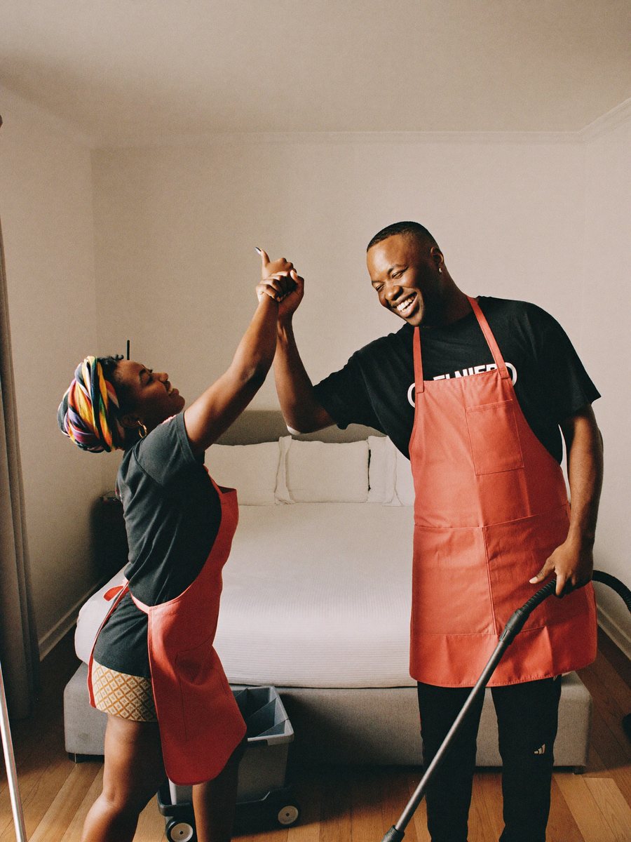 Two team members celebrating a finished room